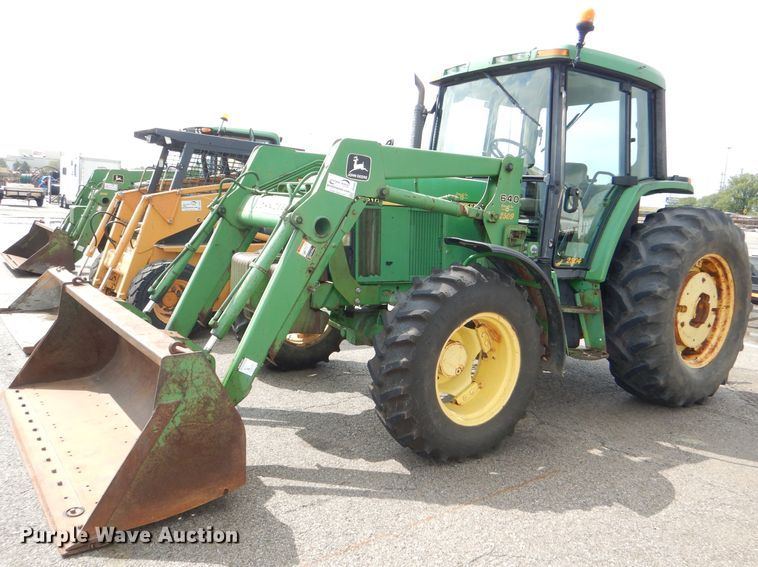 image for item DG4985 1999 John Deere 6310 MFWD tractor