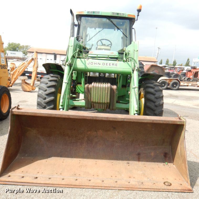 image for item DG4985 1999 John Deere 6310 MFWD tractor