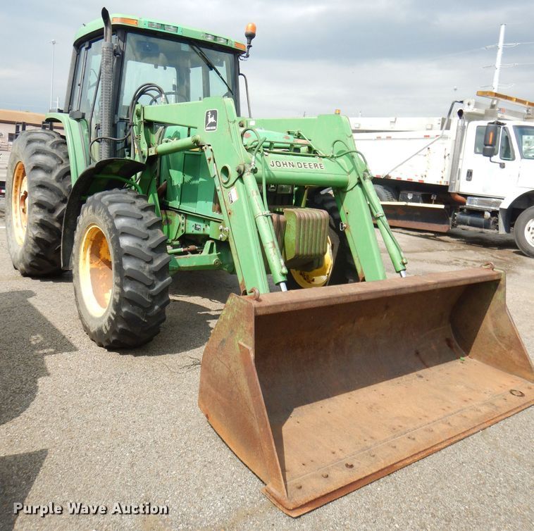 image for item DG4985 1999 John Deere 6310 MFWD tractor