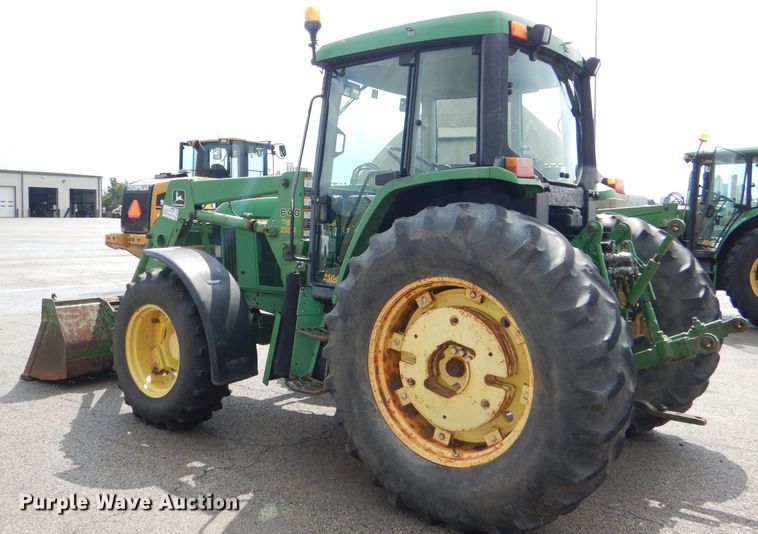 image for item DG4985 1999 John Deere 6310 MFWD tractor