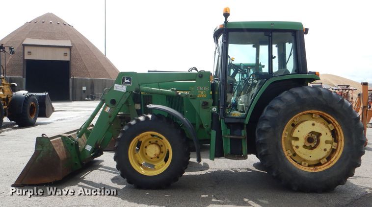 image for item DG4985 1999 John Deere 6310 MFWD tractor