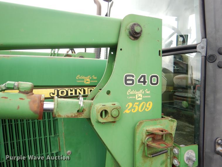 image for item DG4985 1999 John Deere 6310 MFWD tractor