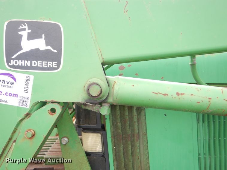 image for item DG4985 1999 John Deere 6310 MFWD tractor