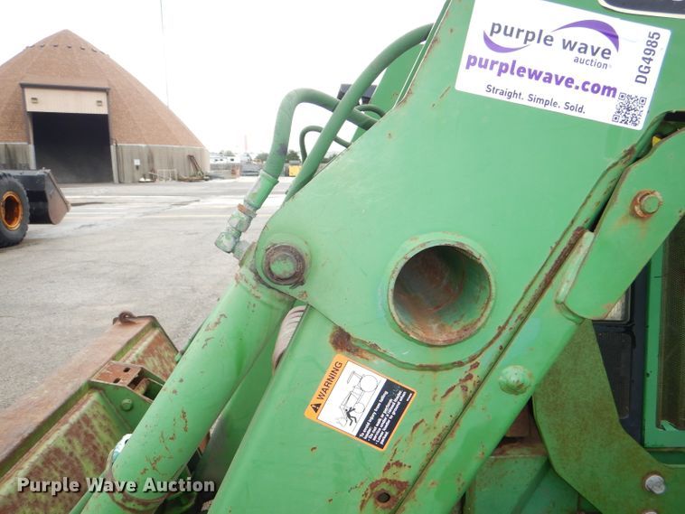 image for item DG4985 1999 John Deere 6310 MFWD tractor
