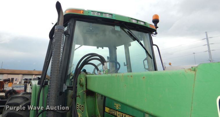 image for item DG4985 1999 John Deere 6310 MFWD tractor