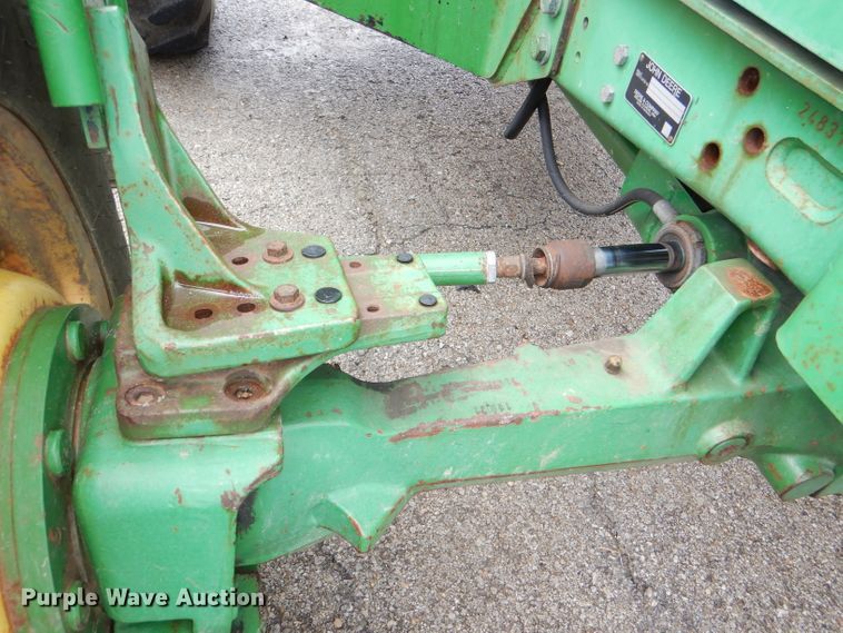 image for item DG4985 1999 John Deere 6310 MFWD tractor