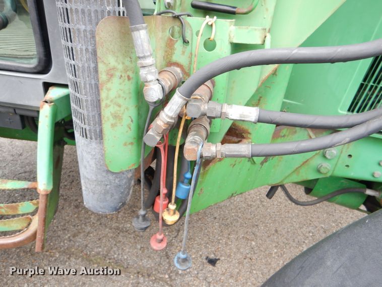 image for item DG4985 1999 John Deere 6310 MFWD tractor