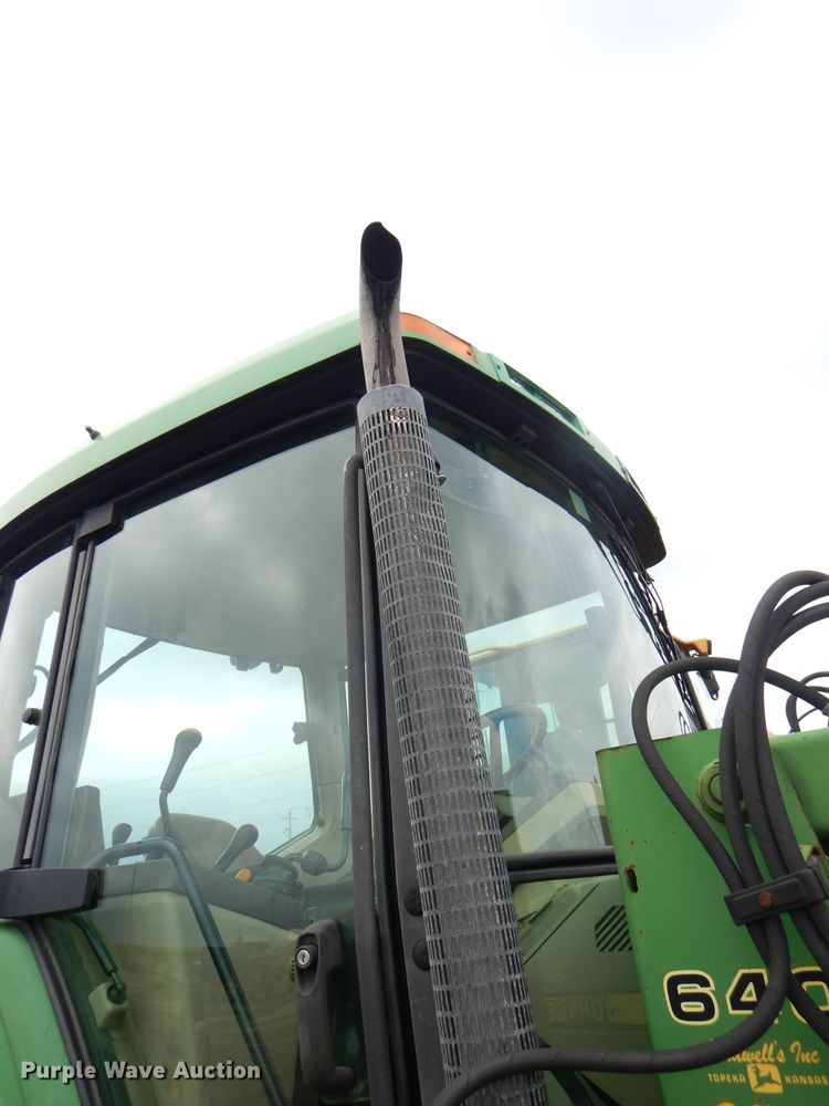 image for item DG4985 1999 John Deere 6310 MFWD tractor