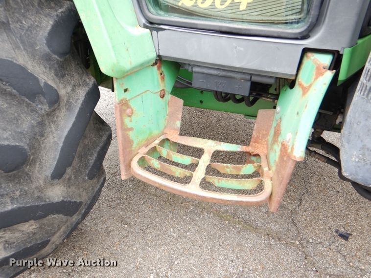 image for item DG4985 1999 John Deere 6310 MFWD tractor