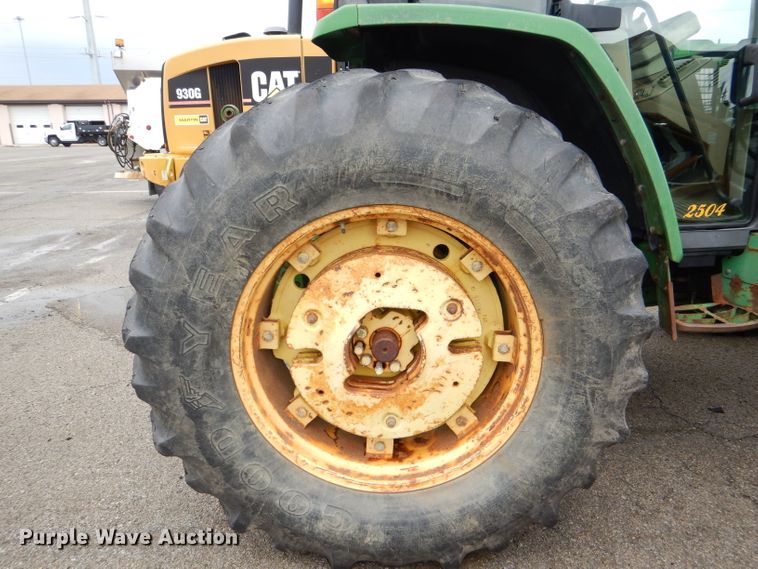 image for item DG4985 1999 John Deere 6310 MFWD tractor