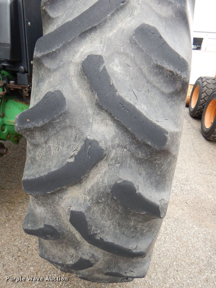 image for item DG4985 1999 John Deere 6310 MFWD tractor