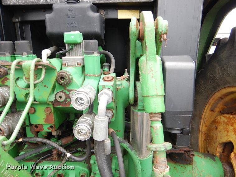 image for item DG4985 1999 John Deere 6310 MFWD tractor