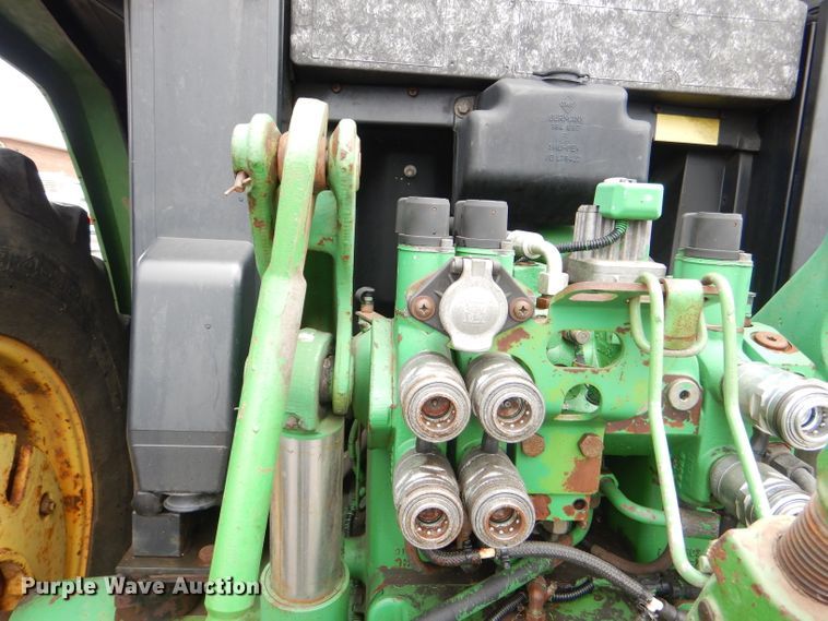 image for item DG4985 1999 John Deere 6310 MFWD tractor