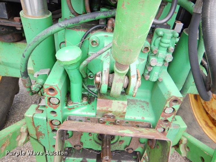image for item DG4985 1999 John Deere 6310 MFWD tractor
