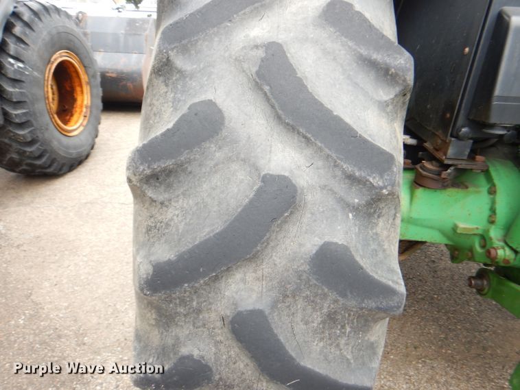 image for item DG4985 1999 John Deere 6310 MFWD tractor