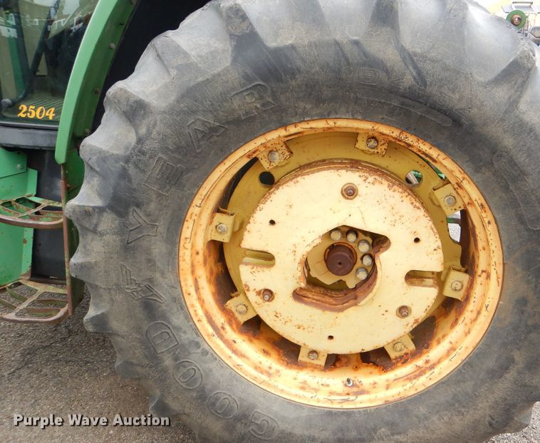 image for item DG4985 1999 John Deere 6310 MFWD tractor