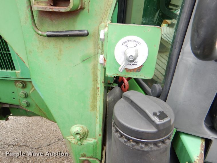 image for item DG4985 1999 John Deere 6310 MFWD tractor