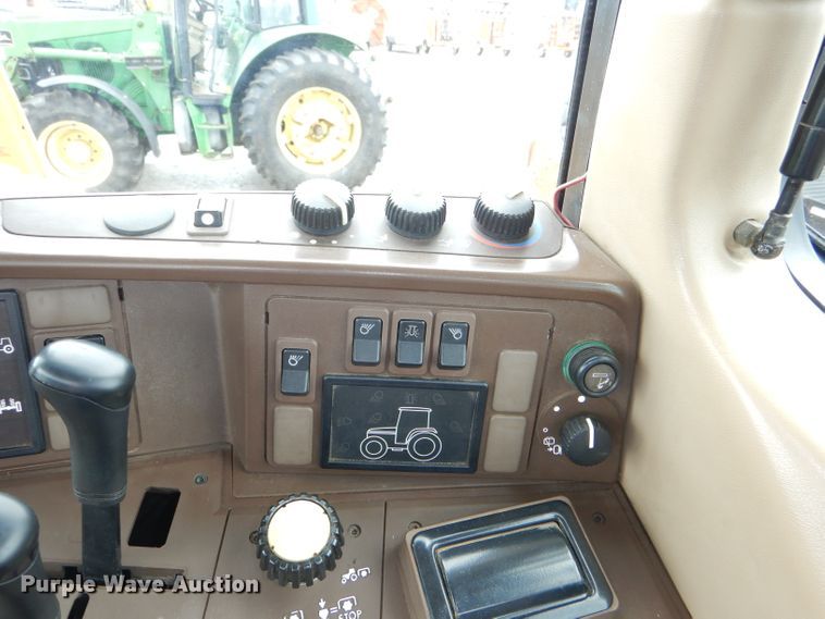 image for item DG4985 1999 John Deere 6310 MFWD tractor