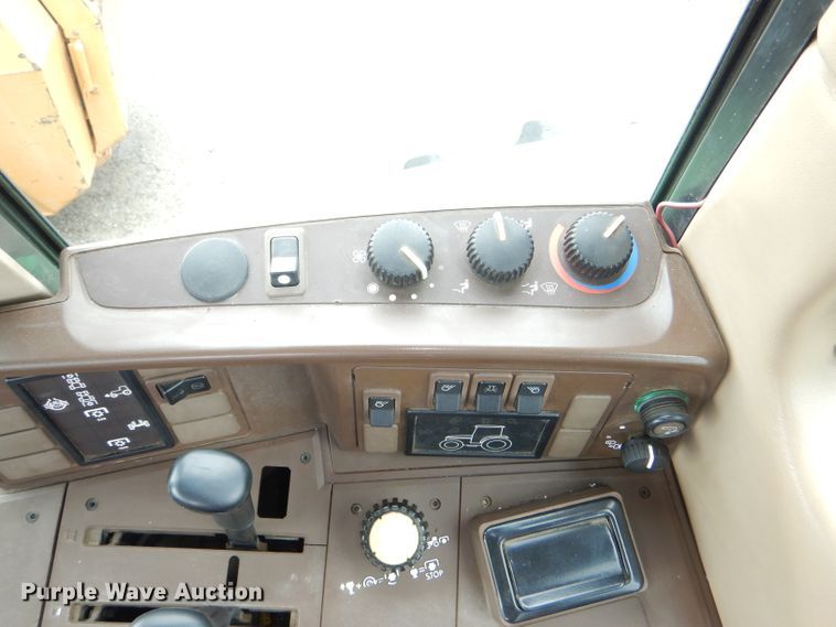 image for item DG4985 1999 John Deere 6310 MFWD tractor