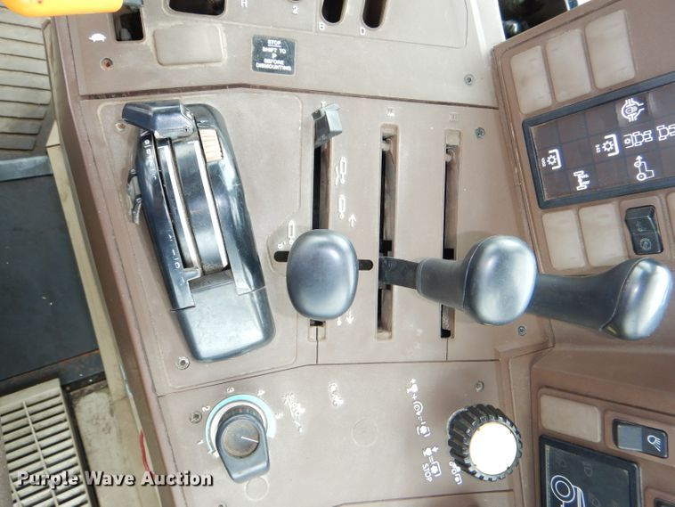 image for item DG4985 1999 John Deere 6310 MFWD tractor