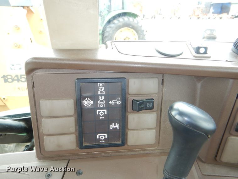 image for item DG4985 1999 John Deere 6310 MFWD tractor