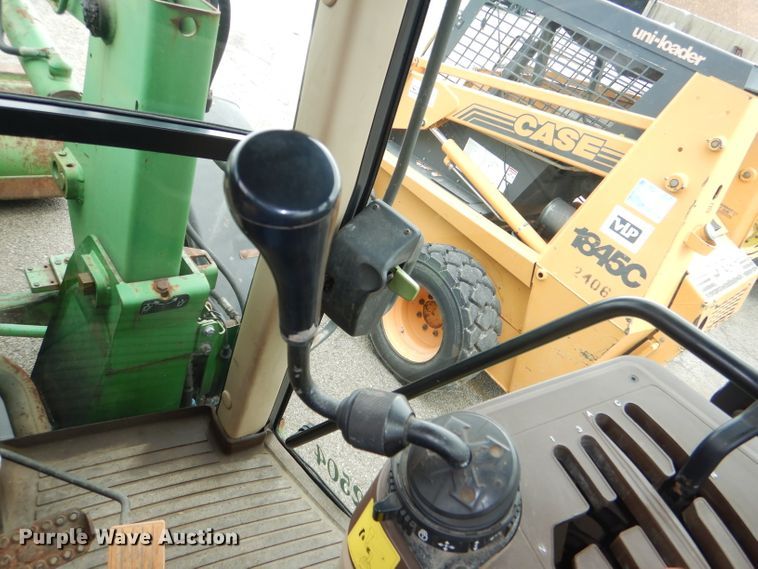 image for item DG4985 1999 John Deere 6310 MFWD tractor