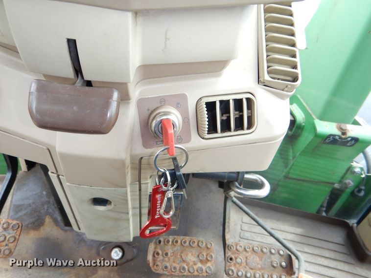 image for item DG4985 1999 John Deere 6310 MFWD tractor