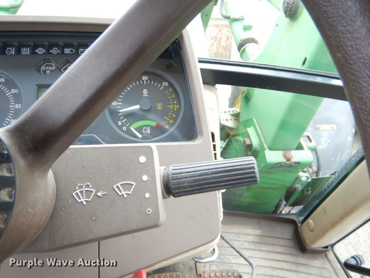 image for item DG4985 1999 John Deere 6310 MFWD tractor