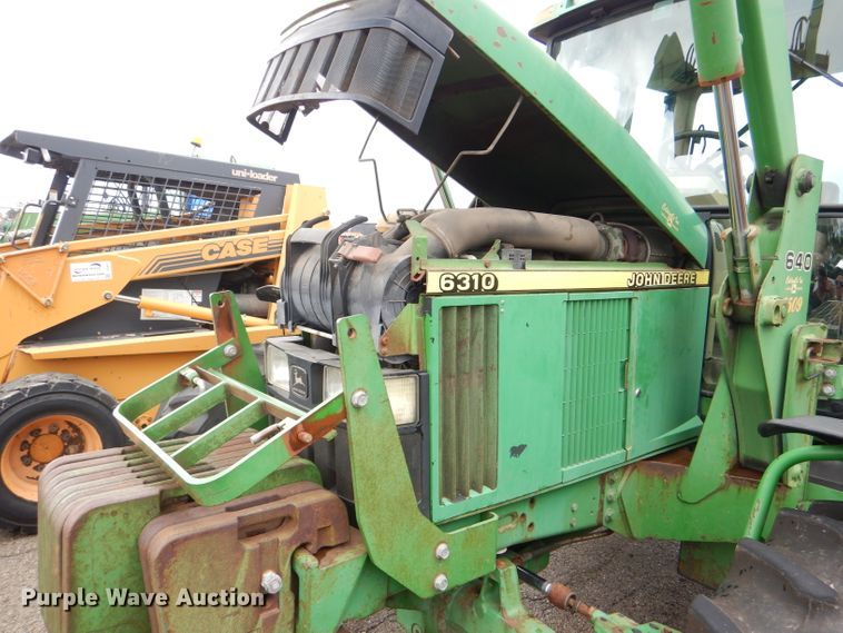 image for item DG4985 1999 John Deere 6310 MFWD tractor