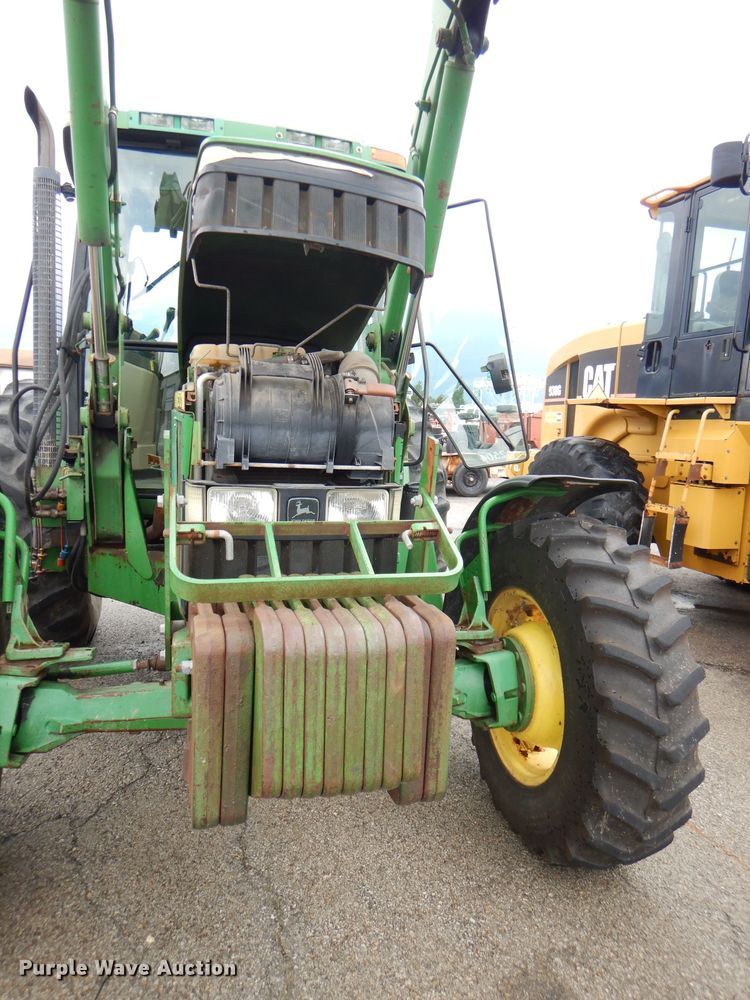 image for item DG4985 1999 John Deere 6310 MFWD tractor