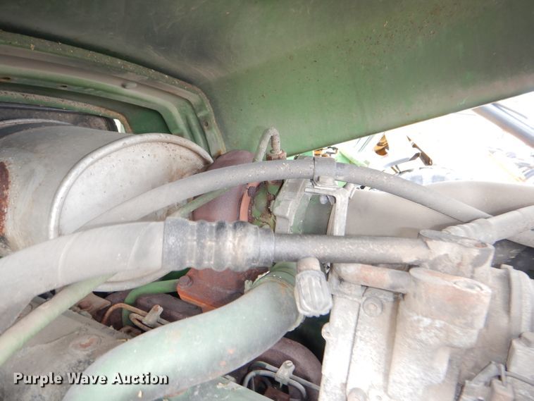 image for item DG4985 1999 John Deere 6310 MFWD tractor