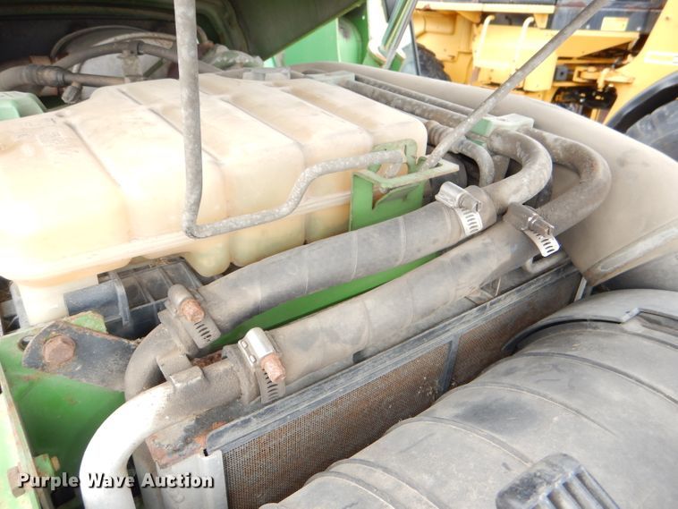 image for item DG4985 1999 John Deere 6310 MFWD tractor