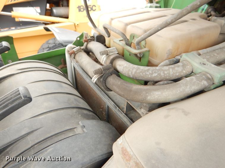 image for item DG4985 1999 John Deere 6310 MFWD tractor