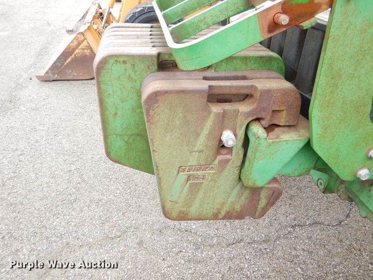 image for item DG4985 1999 John Deere 6310 MFWD tractor