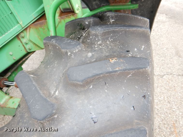 image for item DG4985 1999 John Deere 6310 MFWD tractor