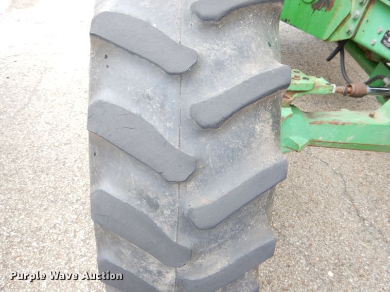 image for item DG4985 1999 John Deere 6310 MFWD tractor