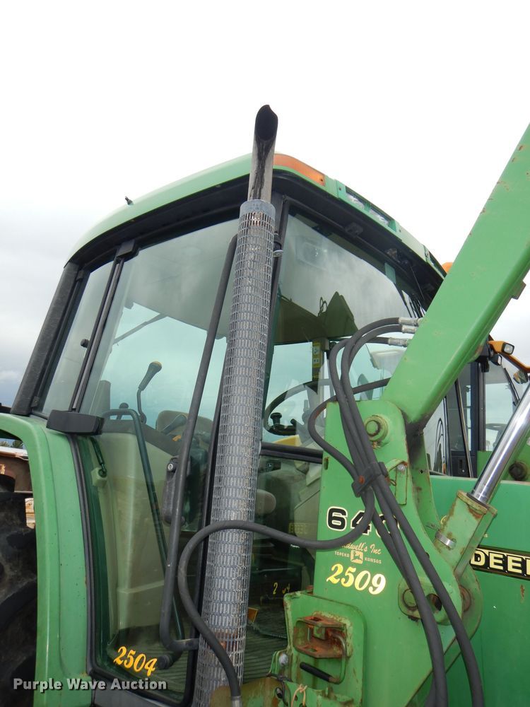 image for item DG4985 1999 John Deere 6310 MFWD tractor