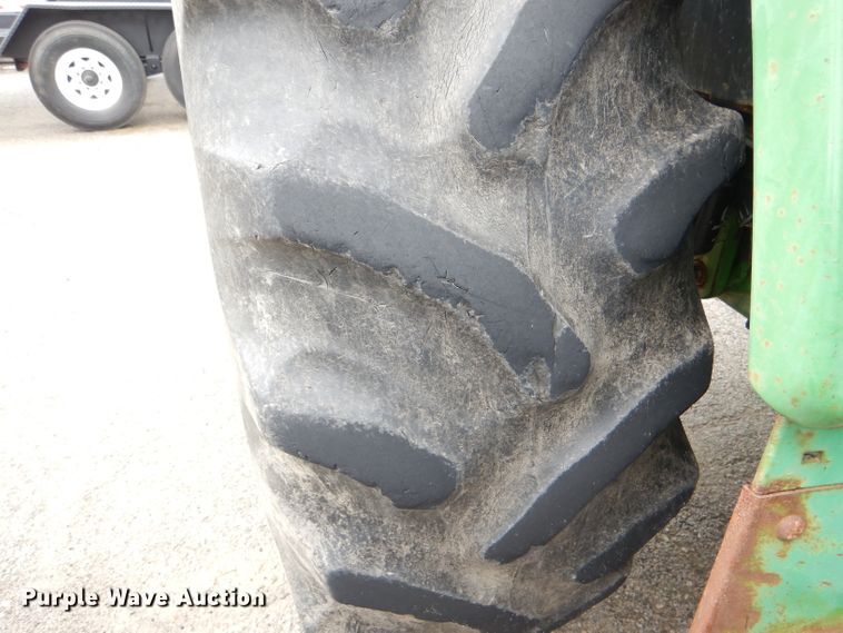 image for item DG4985 1999 John Deere 6310 MFWD tractor