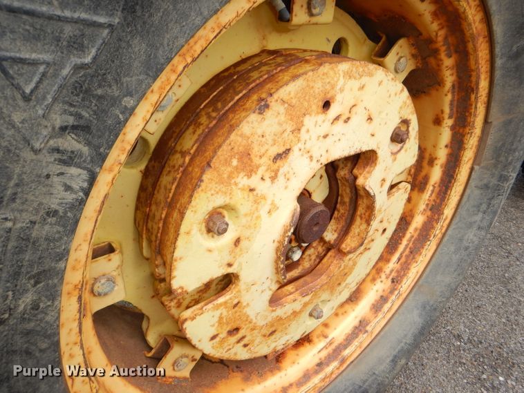 image for item DG4985 1999 John Deere 6310 MFWD tractor