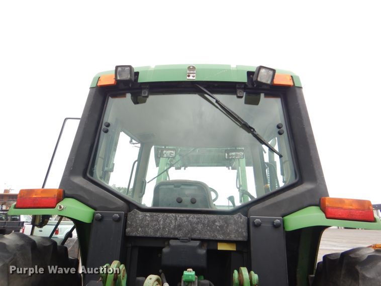 image for item DG4985 1999 John Deere 6310 MFWD tractor