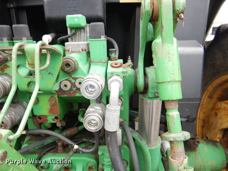 image for item DG4985 1999 John Deere 6310 MFWD tractor