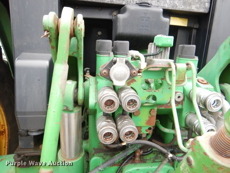 image for item DG4985 1999 John Deere 6310 MFWD tractor