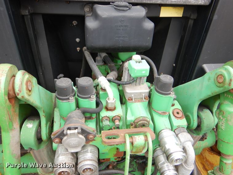 image for item DG4985 1999 John Deere 6310 MFWD tractor