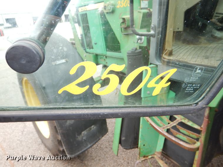 image for item DG4985 1999 John Deere 6310 MFWD tractor
