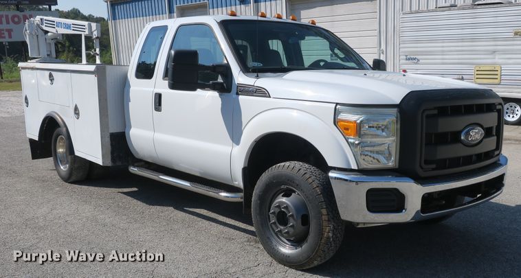 image for item DB10190 2012 Ford F350 Super Duty SuperCab utility bed pickup truck