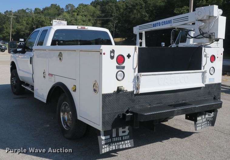 image for item DB10190 2012 Ford F350 Super Duty SuperCab utility bed pickup truck