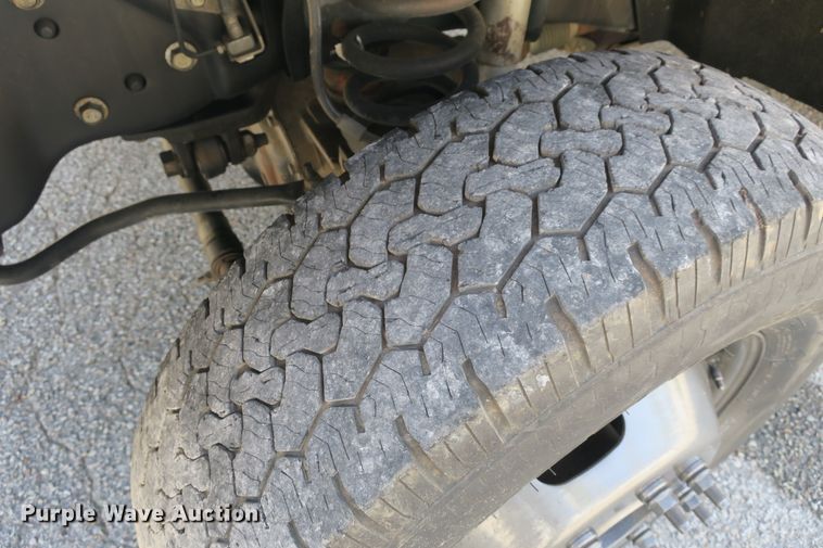 image for item DB10190 2012 Ford F350 Super Duty SuperCab utility bed pickup truck