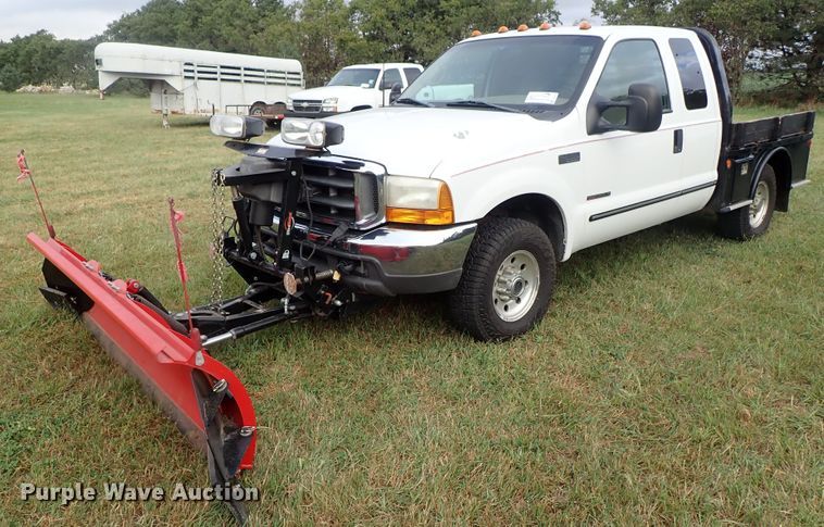 image for item DB7739 1999 Ford F250 Super Duty SuperCab flatbed pickup truck