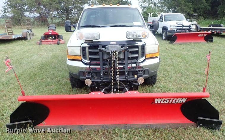 image for item DB7739 1999 Ford F250 Super Duty SuperCab flatbed pickup truck