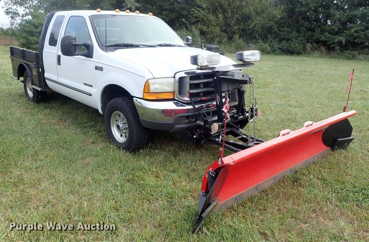 image for item DB7739 1999 Ford F250 Super Duty SuperCab flatbed pickup truck